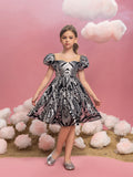 Tween Mädchen-Partykleid mit Puffärmeln und kontrastierendem Netzstoff und Pailletten 